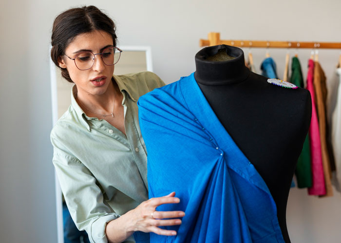 A range of colorful and neatly arranged garments.
